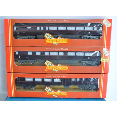 302 - Collection of boxed OO gauge railway passenger and mail coaches to include Hornby, Triang Airfix and... 