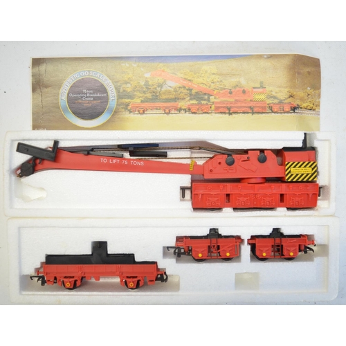 305 - Collection of boxed and unboxed OO gauge rolling stock to include Hornby R6473 Triple Mineral Wagon ... 