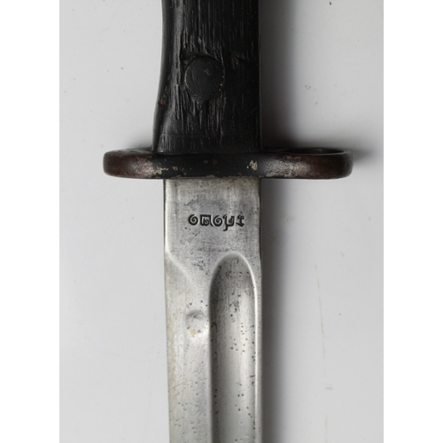 607 - Japanese Arisaka rifle bayonet with South East Asian script on the recasso. In original scabbard but... 