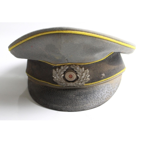 615 - Post war East German Army Signals Officers peak cap with makers label