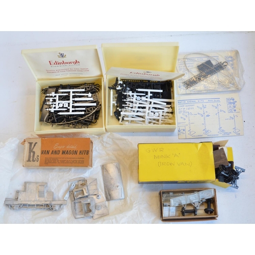 316 - Collection of mostly unbuilt OO, O and TT gauge railway related model kits, mostly plastic but also ... 