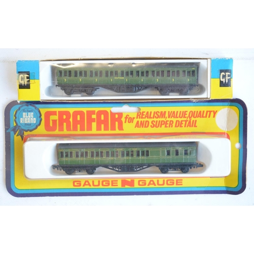 325 - Sixteen boxed N gauge railway coaches from Graham Farish, Lima and Dapol. Contents good to near mint