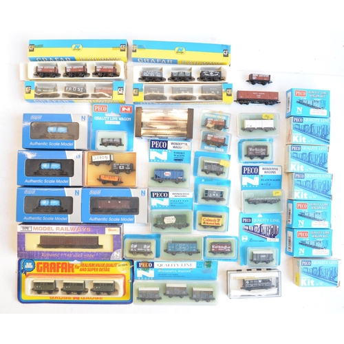 327 - Collection of N gauge rolling stock models from Graham Farish, Peco and Dapol. Contents condition va... 