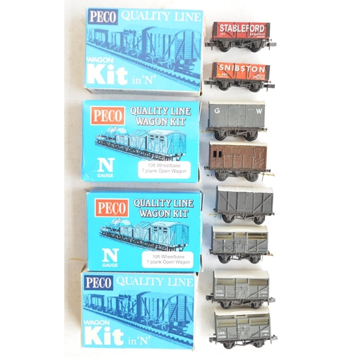 327 - Collection of N gauge rolling stock models from Graham Farish, Peco and Dapol. Contents condition va... 