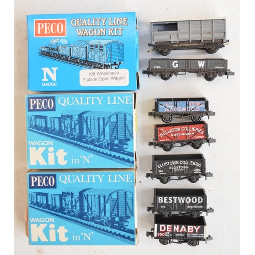 327 - Collection of N gauge rolling stock models from Graham Farish, Peco and Dapol. Contents condition va... 