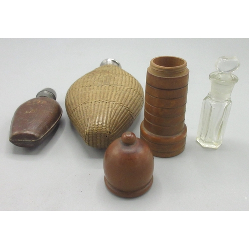 104 - Three scent bottles, comprising rattan/basketweave encased scent flask with monogrammed white metal ... 