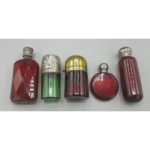 108 - Collection of ruby and green coloured glass scent bottles, incl. three with hallmarked silver tops, ... 