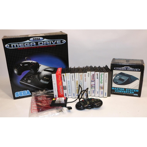 376 - Sega Mega Drive 1 TV games console with control pad, Sega Mega Drive Master System Converter, and a ... 