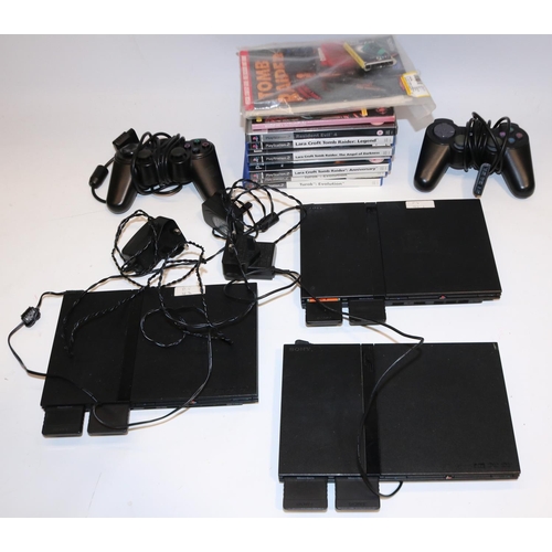 379 - Three slimline PlayStation PS2 games consoles, controllers, and seven PS2 games (qty.)