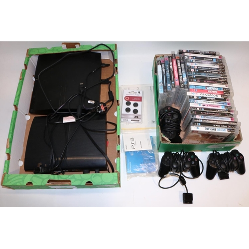 380 - Two PlayStation PS3 games consoles, three controllers, and approx. 30 games (qty.)