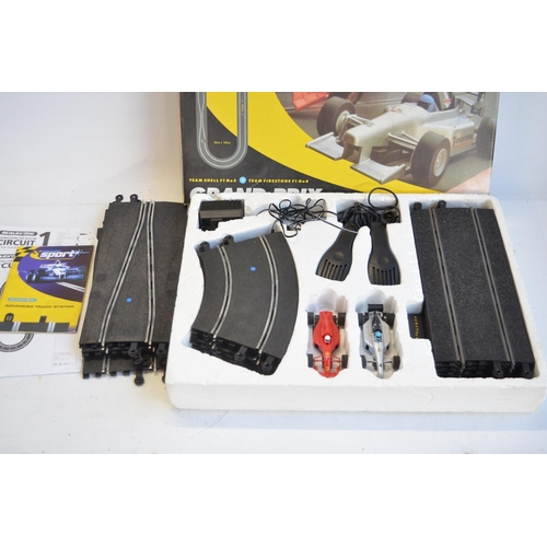 264A - Two boxed Scalextric sets to include C1018 Renault Megane World Rallye and Team Shell/Team Firestone... 