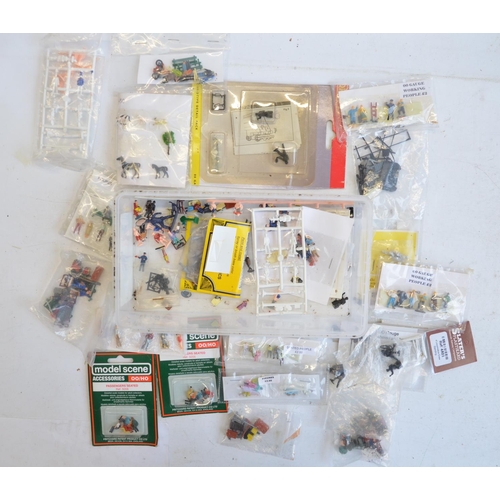 329 - Extensive collection of OO/HO gauge model railway scenic accessories to include figures, trees, buil... 