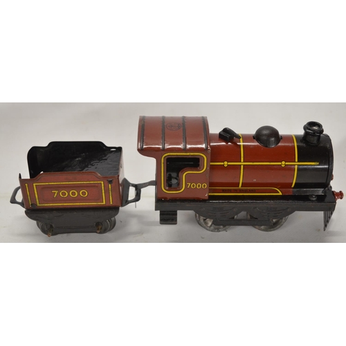 331 - Vintage Brimtoy tinplate clockwork train set with 0-4-0 steam loco (in working order), tender, 2 goo... 