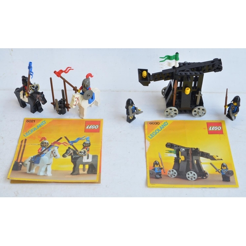 336 - Twelve vintage boxed Medieval themed Lego sets to include boxed 6054 Forestmen's Hideout, 6039, 6103... 