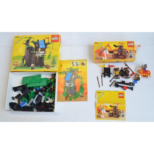 336 - Twelve vintage boxed Medieval themed Lego sets to include boxed 6054 Forestmen's Hideout, 6039, 6103... 