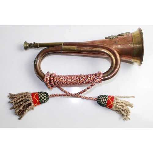 622 - Brass and copper Military bugle with rope 'colours' for the Royal Welsh Fusiliers