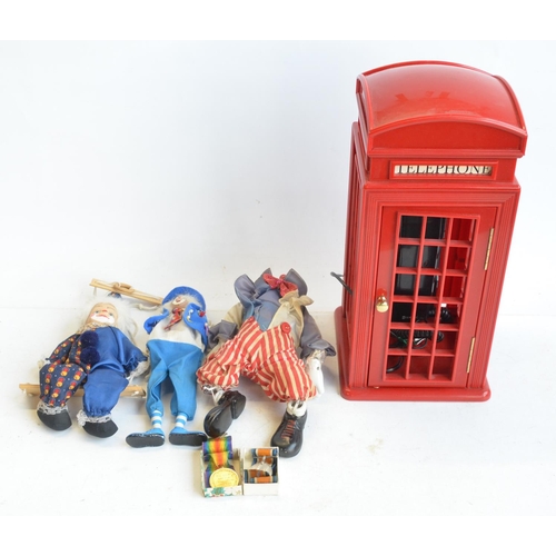 524 - Novelty red telephone box phone by Astral International, 2 clowns and 2 Great War medals to Private ... 