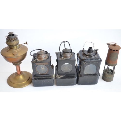 461 - Five vintage metal paraffin lamps to include 3 railway lamps one marked LNER, another BR(E) and the ... 