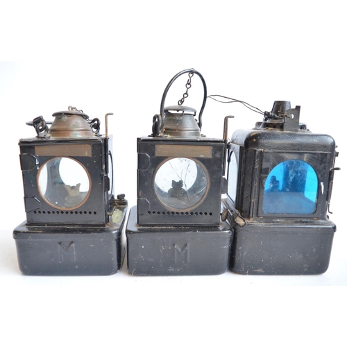 461 - Five vintage metal paraffin lamps to include 3 railway lamps one marked LNER, another BR(E) and the ... 