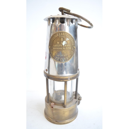 463 - Four vintage metal lamps to include Wolf Safety Lamp, a Type 6 Eccles safety lamp by The Protector L... 