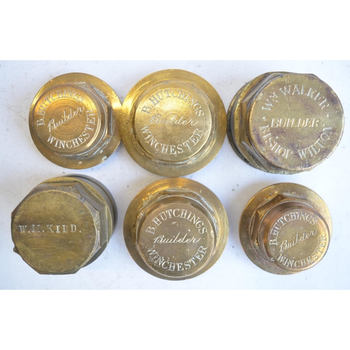 464 - Collection of vintage brass coach and wheel nuts to include Austin, W M Kidd, B Hutchings and W M Wa... 