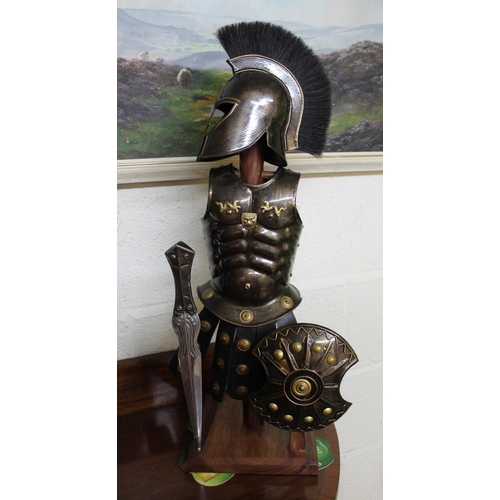 610 - Detailed model of a Roman Centurion with Gladius on stand. 54cm.  A Greek soldier with shield and sw... 