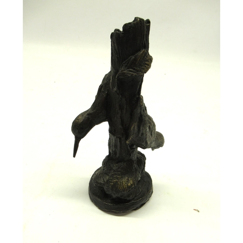 306 - Bronze sculpture in the form of a tree stump with two green woodpeckers and foliage, base stamped GB... 