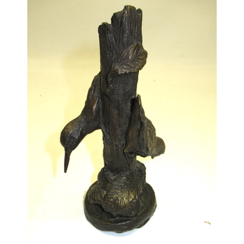 306 - Bronze sculpture in the form of a tree stump with two green woodpeckers and foliage, base stamped GB... 