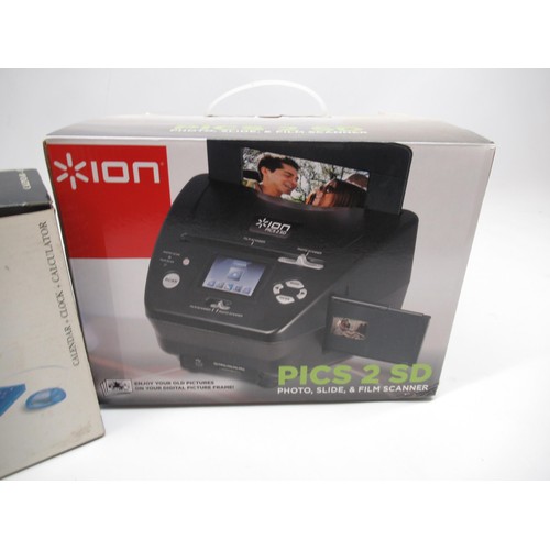 304 - Ion 'pics to SD' photo, slide and film scanner, and alarm clock and calendar in the form of a miniat... 