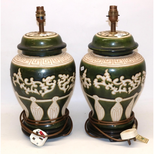 126 - Pair of large green and cream ceramic table lamps in the style of Chinese temple jars, H44cm incl. f... 