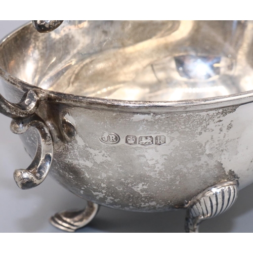 149 - Art Deco Silver sauce boat with scalloped edges and a sweeping curved handle, Sheffield, 1927, John ... 