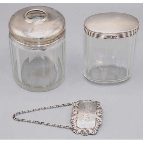 65 - Two Art Deco dressing table silver and glass jars, of a oval and round shape, London, 1927, Finnigan... 