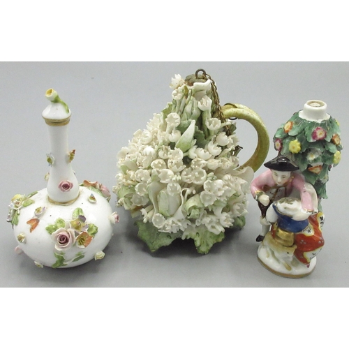 106 - Three porcelain scent bottles - comprising a Meissen bottle form scent bottle with applied flowers; ... 