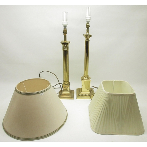 202 - Two late C20th brass and brass effect Corinthian column table lamps, max. H65cm, with shades (2)