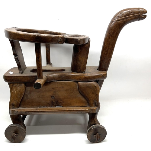 286 - Carved wood child's ride on camel, probably Chinese, H60cm