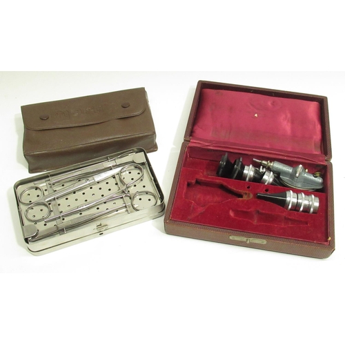 1099 - Collection of medical and surgical instruments inc. scalpels, cased syringe set, forceps, etc.