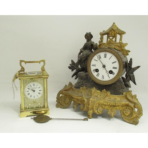 1111 - David Peterson, C20th 8 day brass carriage clock, signed white Roman dial with applied fretwork deco... 