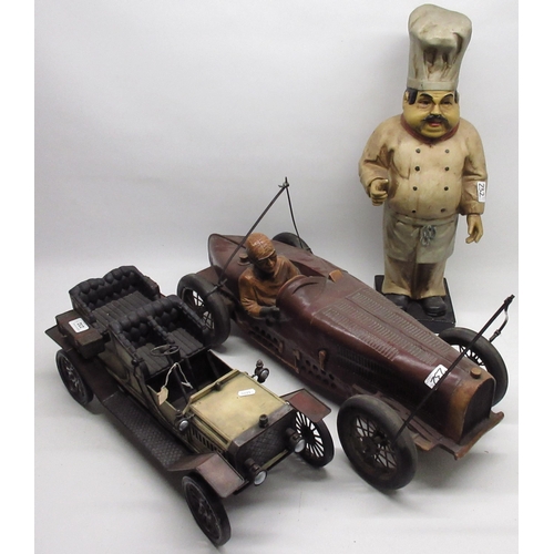 232 - Two composition model cars, max. L70cm, and a similar figure of a chef (3)