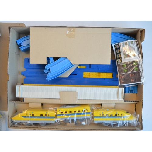 1303 - Collection of boxed Japanese Imported Takara Tomy/PlaRail battery operated plastic model train sets ... 