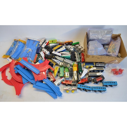 1314 - Collection of Takara Tomy battery powered plastic model train sets to include trains packs, layout s... 