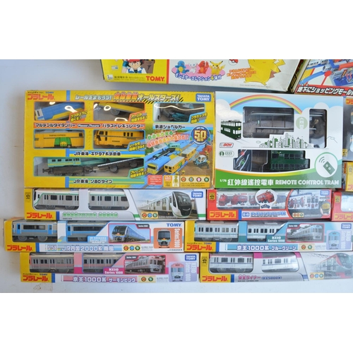 1316 - Collection of Tomy and Takara Tomy battery powered plastic model train sets to include trains packs,... 