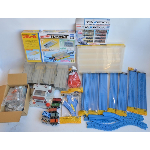 1316 - Collection of Tomy and Takara Tomy battery powered plastic model train sets to include trains packs,... 