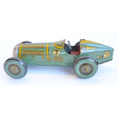 6 - Vintage Mettoy clockwork Race Car No7 in working order, no key. Length approx 39cm. Excellent condit... 