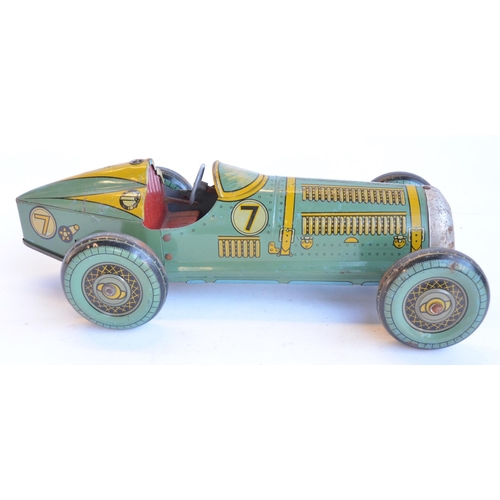 6 - Vintage Mettoy clockwork Race Car No7 in working order, no key. Length approx 39cm. Excellent condit... 