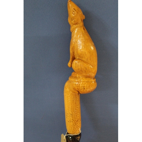 1173 - David Hames - a walking stick with twist carved shaft and rodent carved handle, signed on metal ferr... 