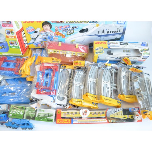 1309 - Collection of boxed Japanese Imported Takara Tomy/PlaRail battery operated plastic model train and v... 