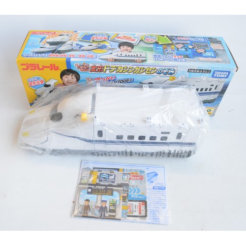 1309 - Collection of boxed Japanese Imported Takara Tomy/PlaRail battery operated plastic model train and v... 