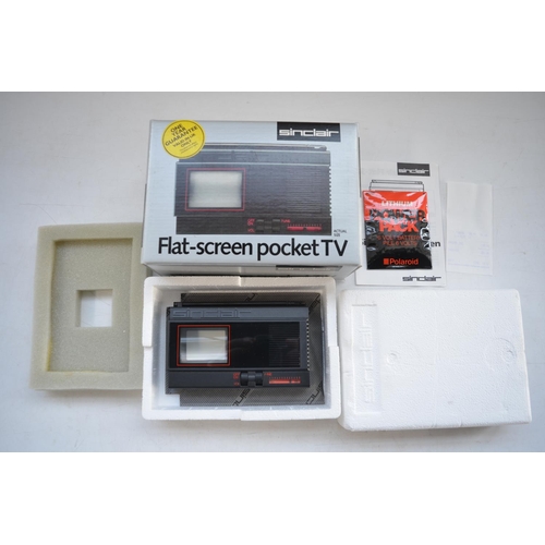 1194 - Sinclair flat screen pocket television in as new unused condition, complete with instructions, an un... 