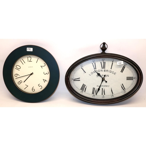 179 - Two modern decorative wall clocks incl. one printed 'London Bridge, Platform 2', max. L50cm