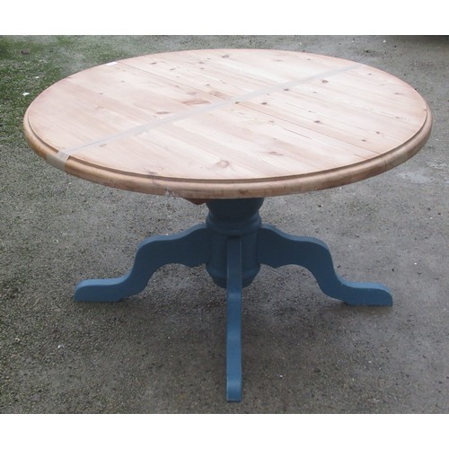 1050 - Modern pine dining table, circular extending top on blue painted column support and four outsplayed ... 